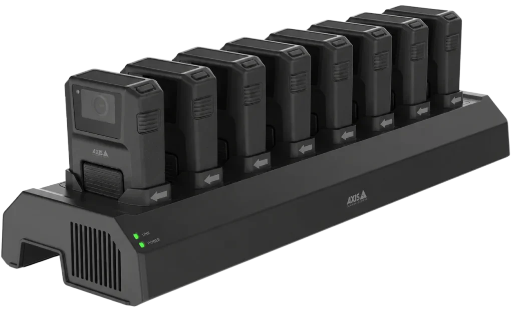 AXIS W701 Mk II 8-bay docking station charging eight AXIS body-worn cameras with green LED lights on