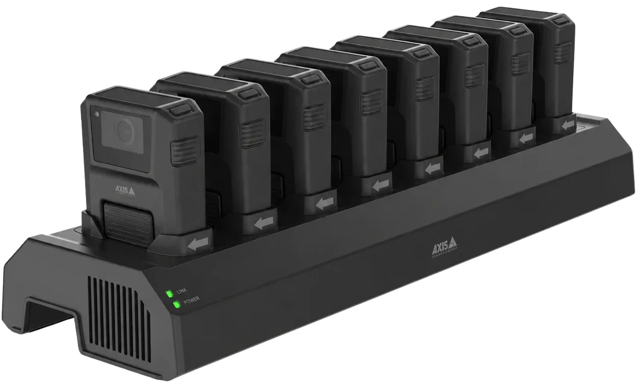 AXIS W701 Mk II 8-bay docking station charging eight AXIS body-worn cameras with green LED lights on