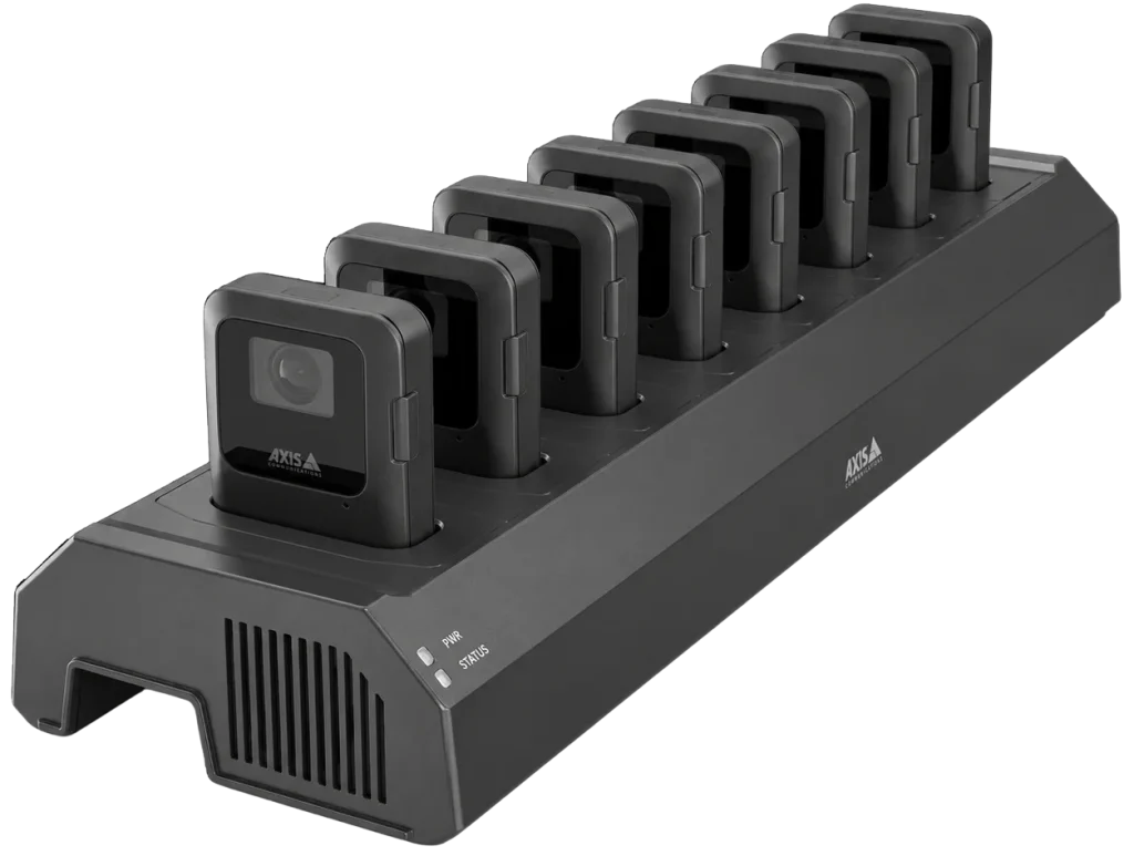AXIS W703 8-bay docking station with eight body-worn cameras inserted for charging and data uploads.