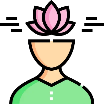 Person meditating with lotus flower representing mindfulness.