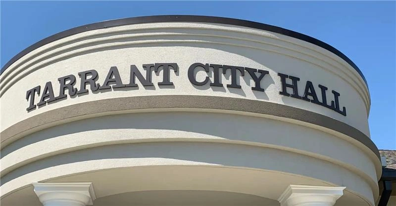 Front view of Tarrant City Hall building under clear sky representing one of Alabama’s unsafe cities 2025.
