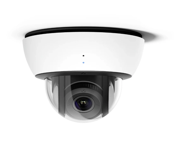 Wide-angle dome surveillance camera with high-definition lens for business security.